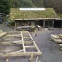 An oak frame being test fitted in the yard.